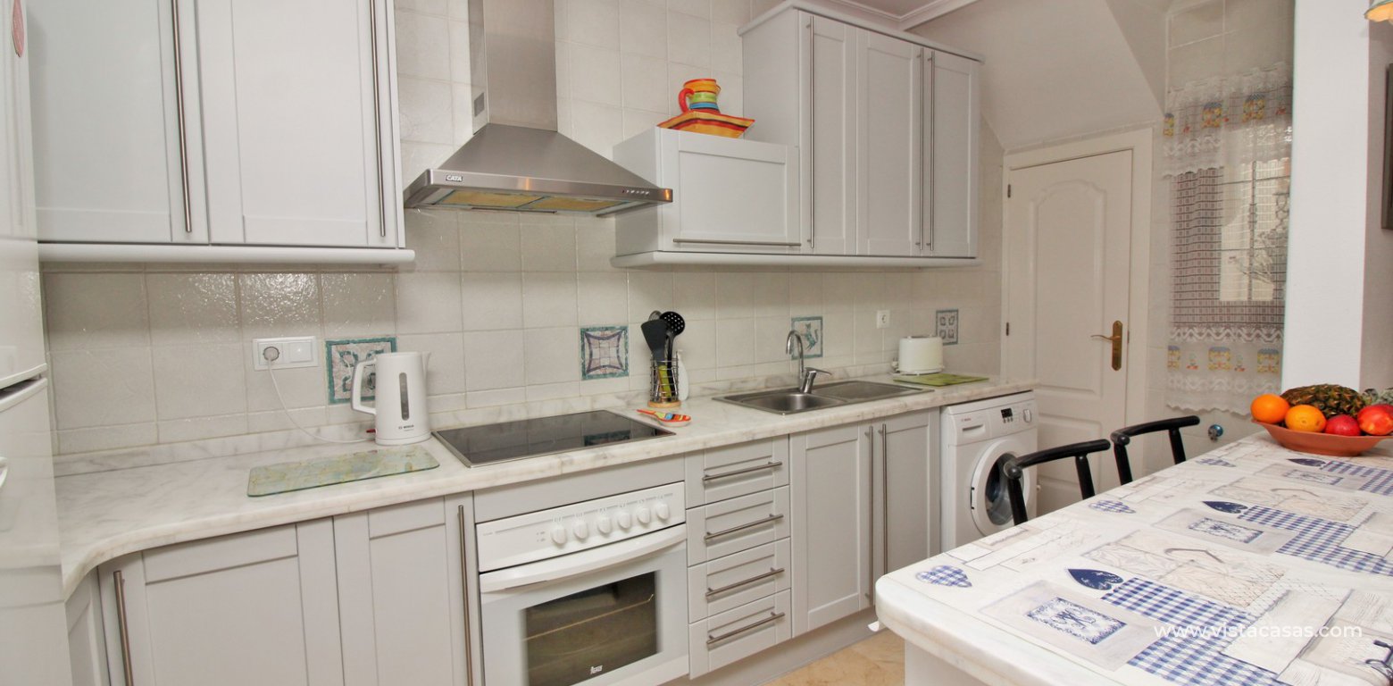 South facing Lola bungalow for sale calle Nabucco Pau 8 Villamartin kitchen