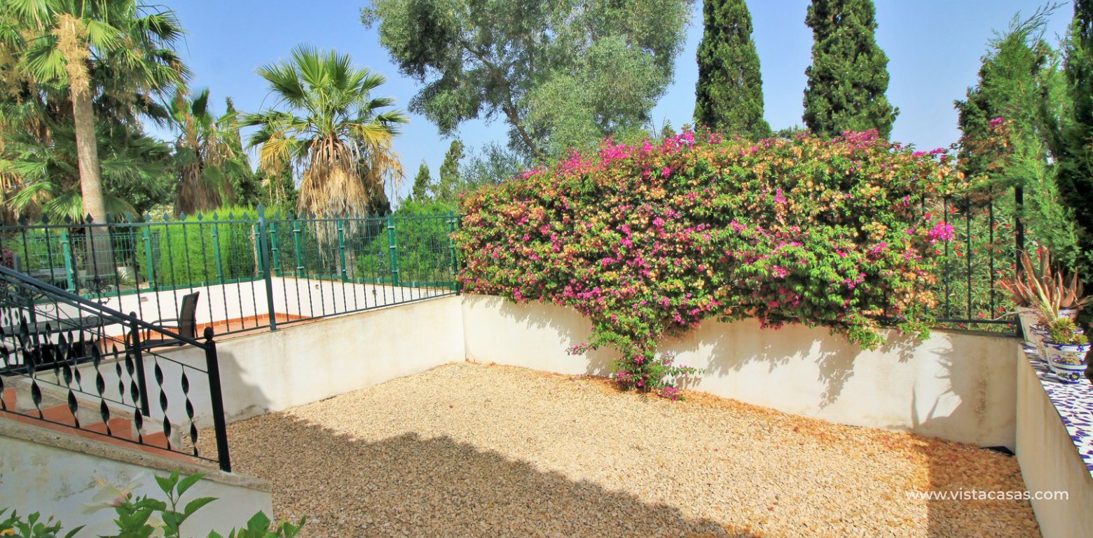 South facing Lola bungalow for sale calle Nabucco Pau 8 Villamartin rear garden