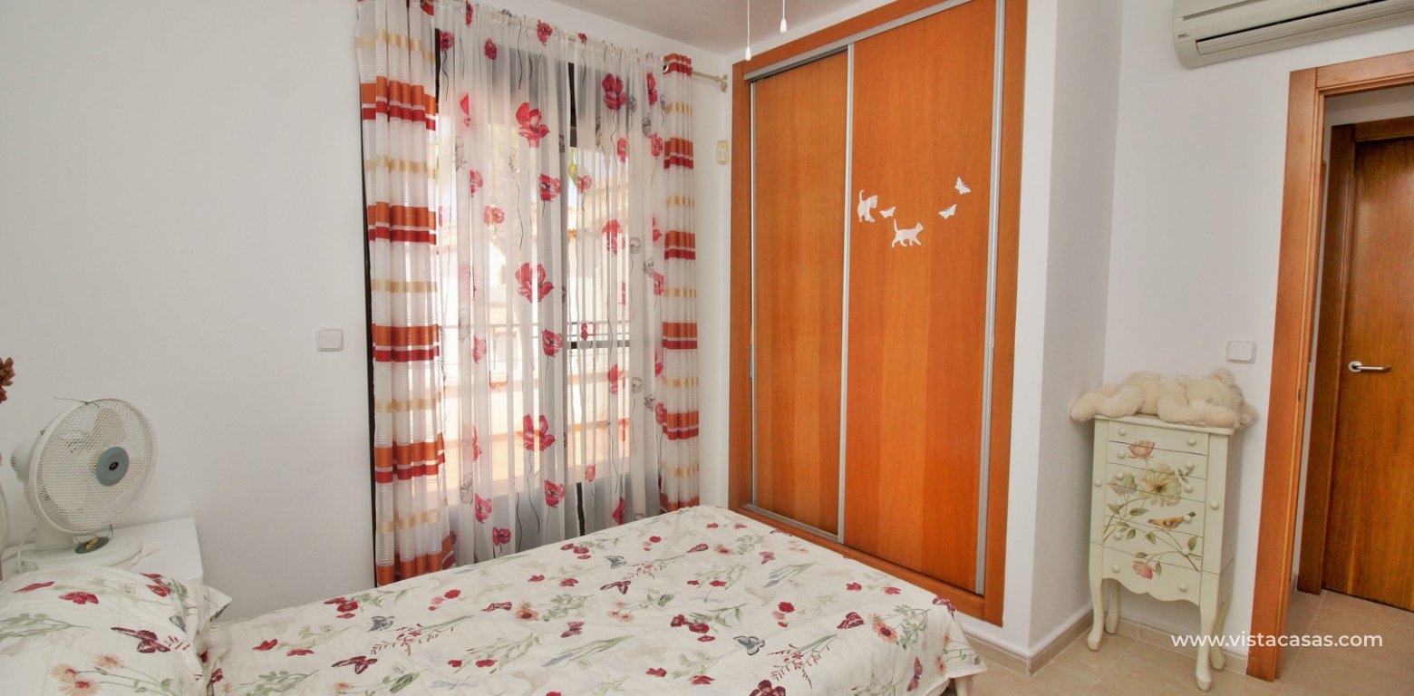 3 bedroom villa for sale overlooking the pool El Palmeral Pau 8 Villamartin master bedroom fitted wardrobes