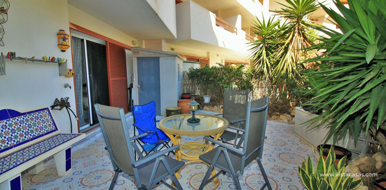 Ground floor apartment for sale El Rincon Playa Flamenca tiled garden