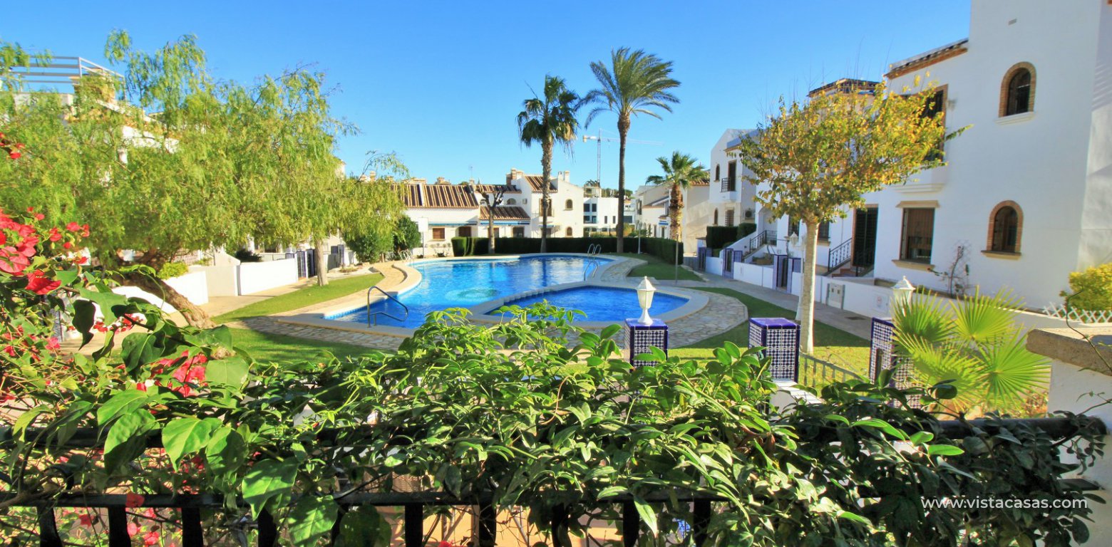 Ground floor corner apaertment overlooking the pool for sale pau 8 villamartin pool view
