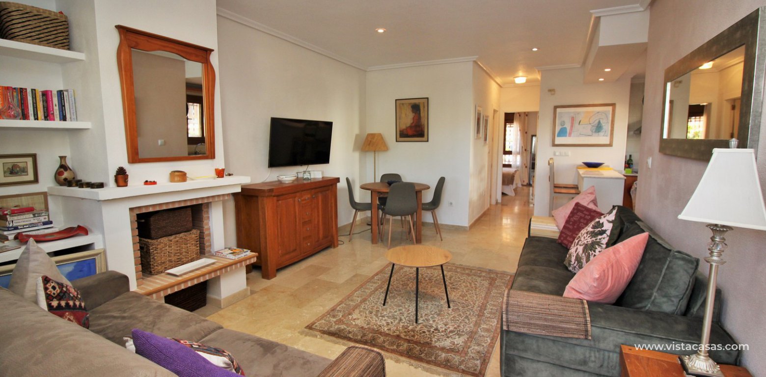 Ground floor corner apaertment overlooking the pool for sale pau 8 villamartin living room