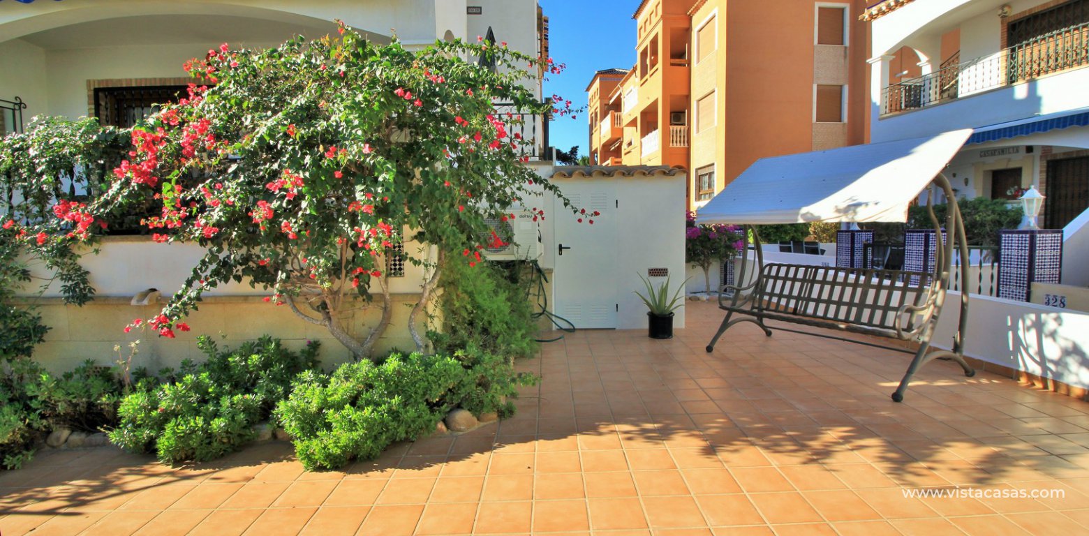 Ground floor corner apaertment overlooking the pool for sale pau 8 villamartin garden 2
