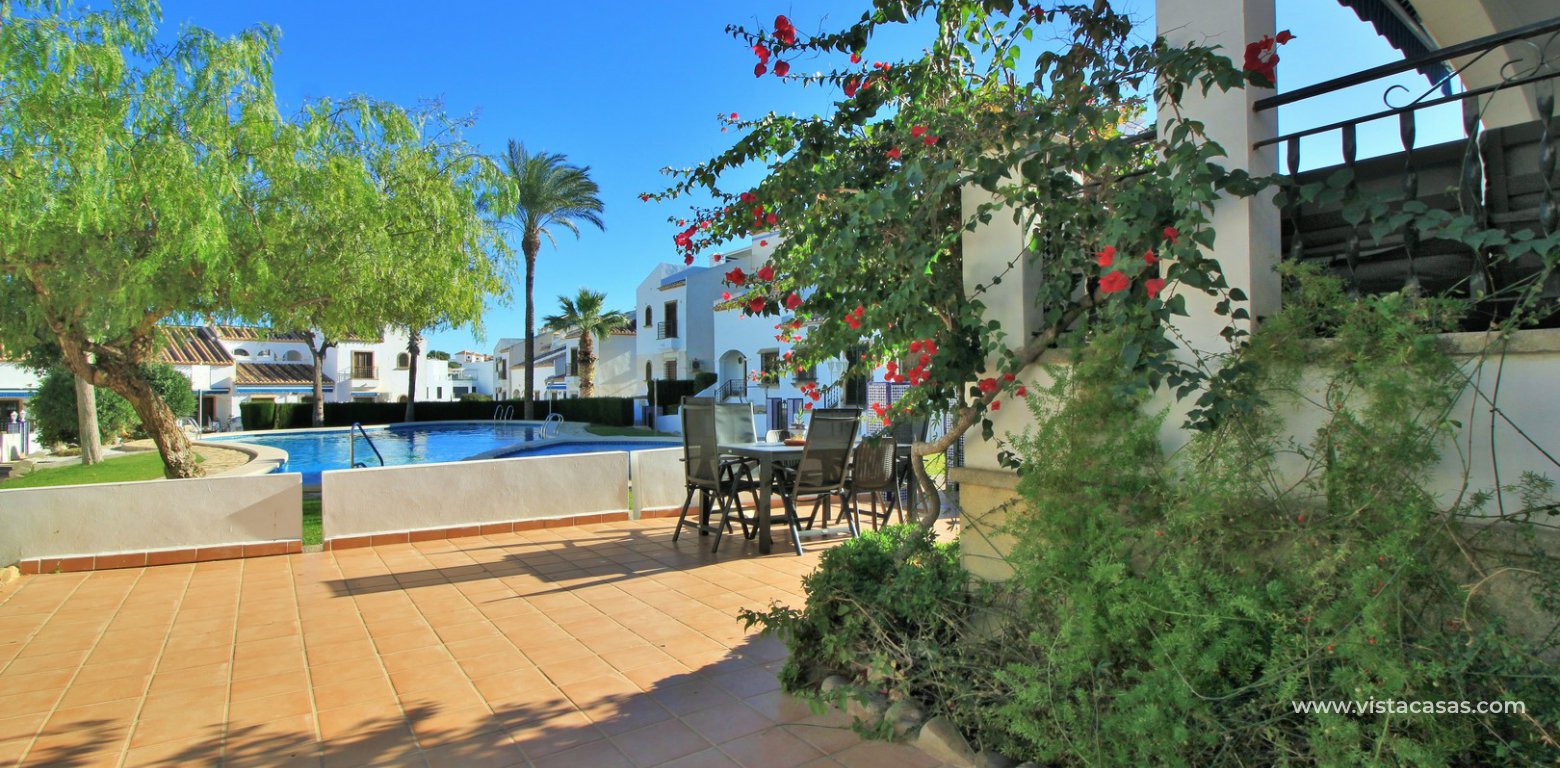 Ground floor corner apaertment overlooking the pool for sale pau 8 villamartin garden 3