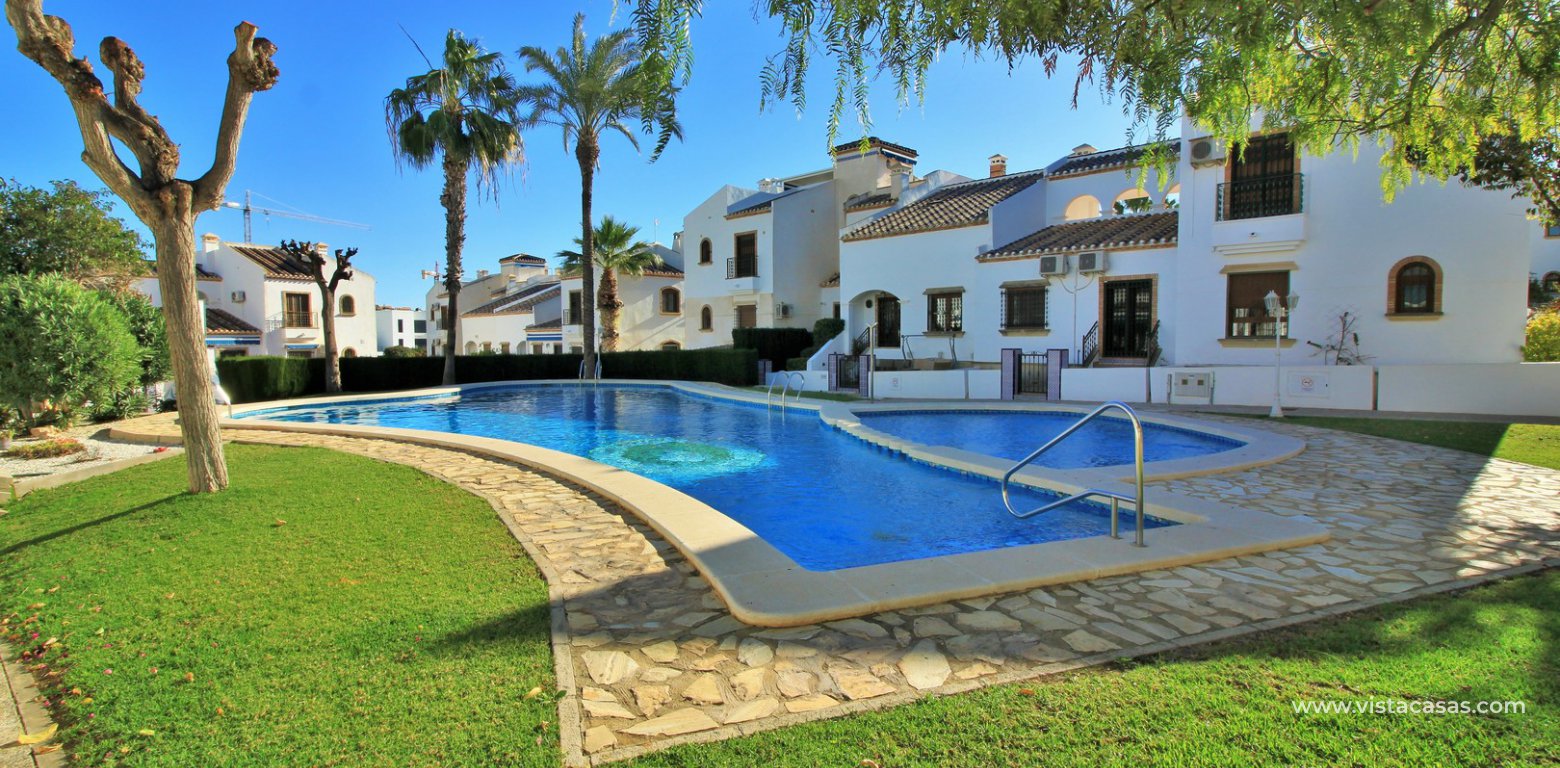 Ground floor corner apaertment overlooking the pool for sale pau 8 villamartin pool