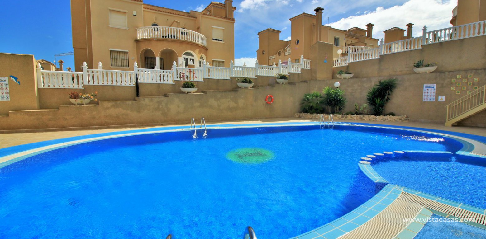 3 bedroom Zodiaco quad for sale Villamartin communal swimming pool