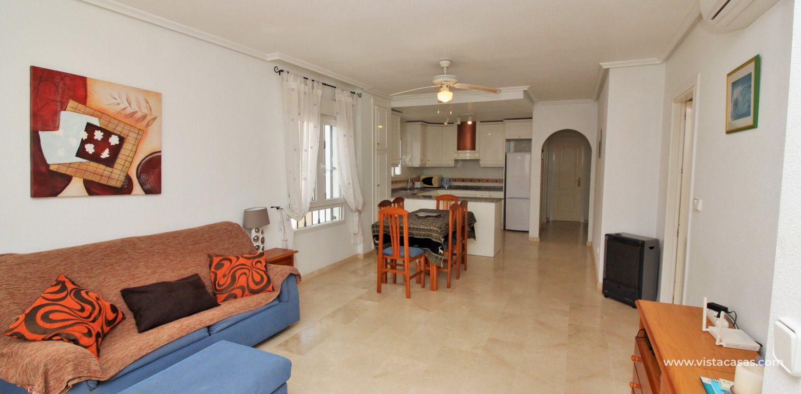 Apartment with pool view for sale Las Violetas Villamartin lounge