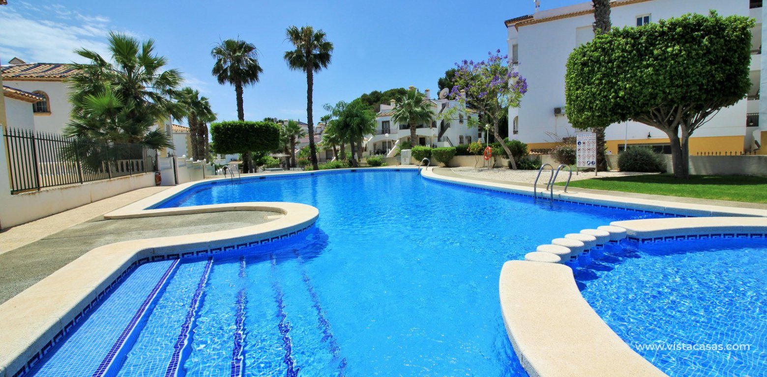 Apartment with pool view for sale Las Violetas Villamartin communal pool