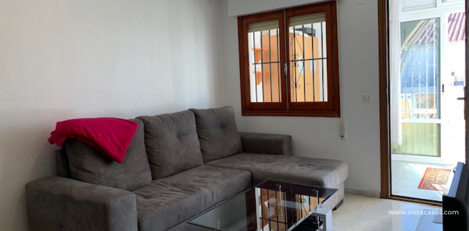 Bungalow for sale in San Luis living room 1