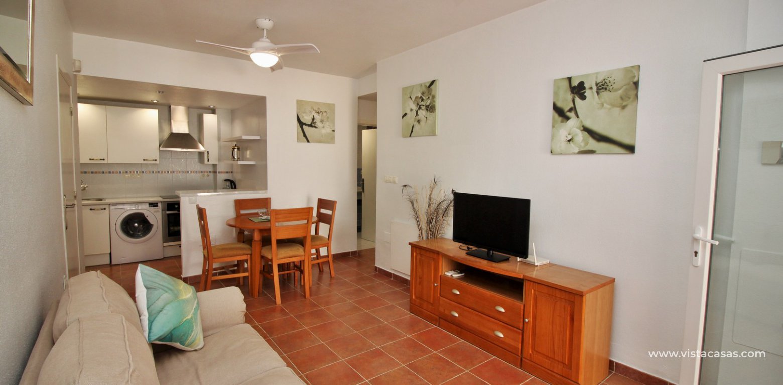 Ground floor apartment with communal pool for sale Panorama Golf Villamartin lounge 2