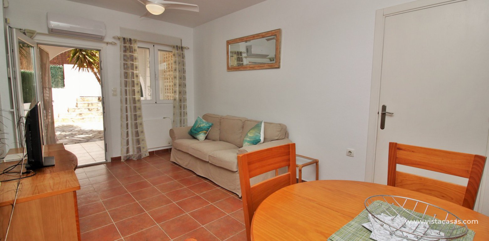 Ground floor apartment with communal pool for sale Panorama Golf Villamartin living area