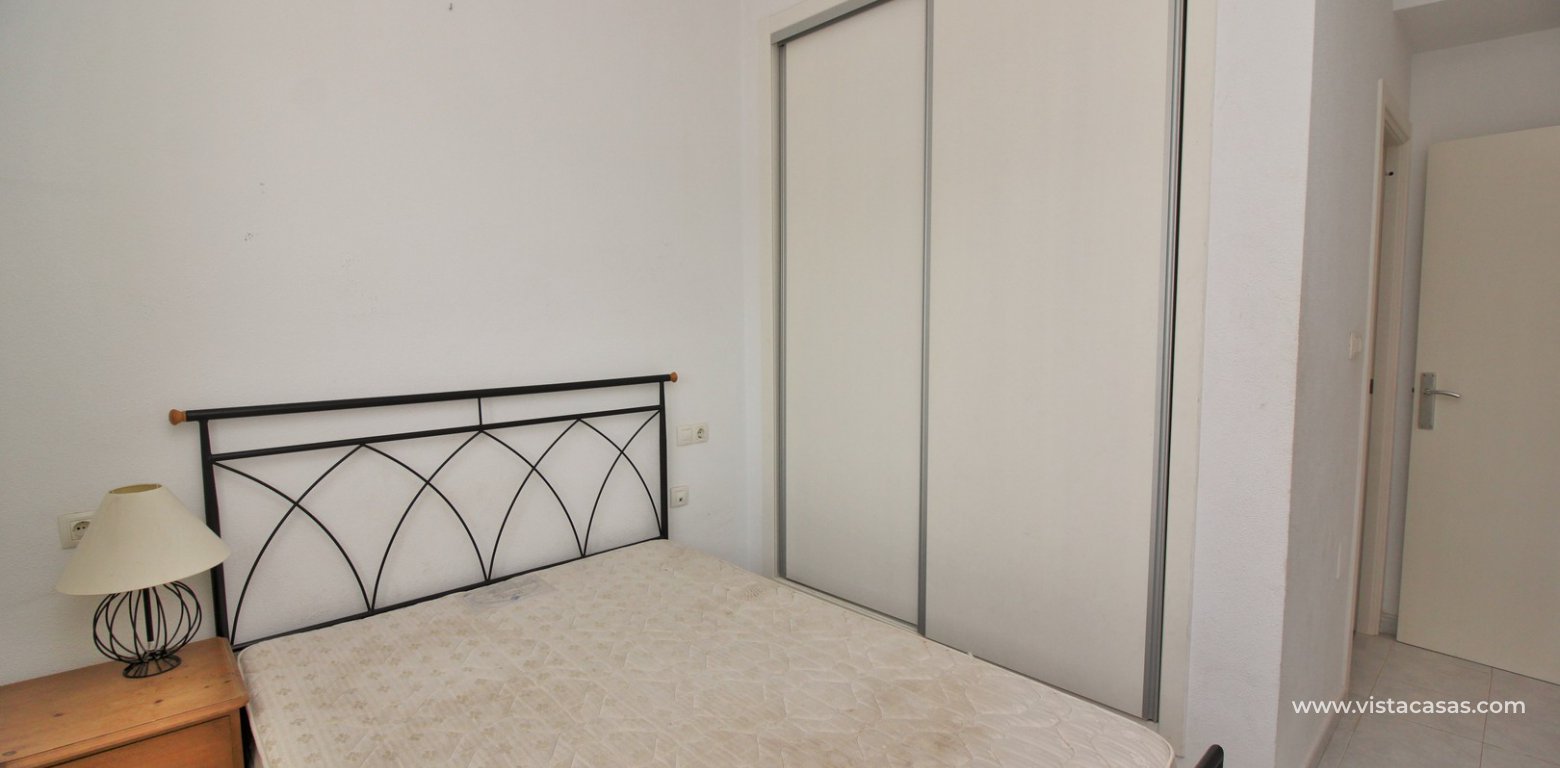 South facing top floor apartment for sale Panorama Golf Villamartin master bedroom fitted wardrobes