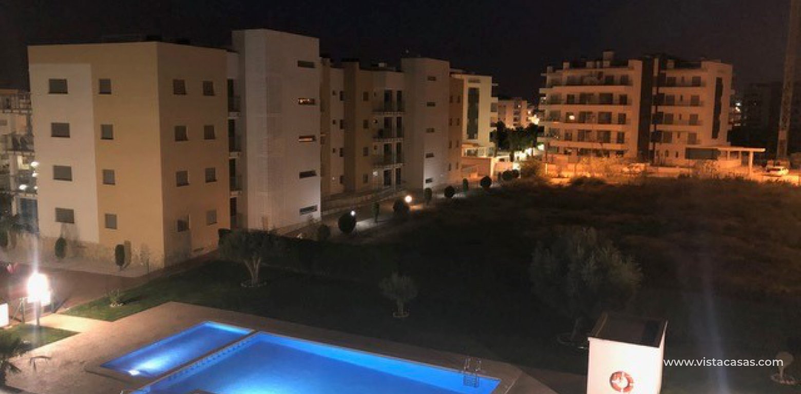 Penthouse for sale in Villamartin pool at night