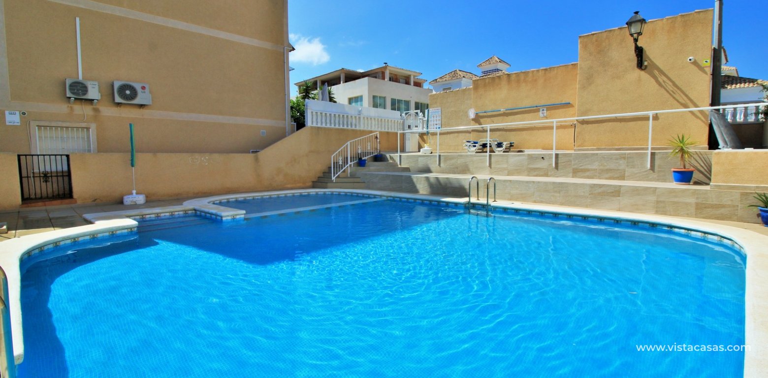 Townhouse for sale Costa Dorada III Villamartin swimming pool