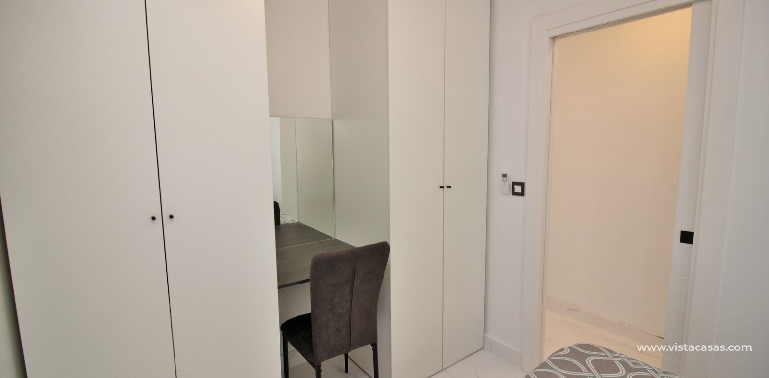 Renovated apartment for sale Villamartin Plaza bedroom wardrobes