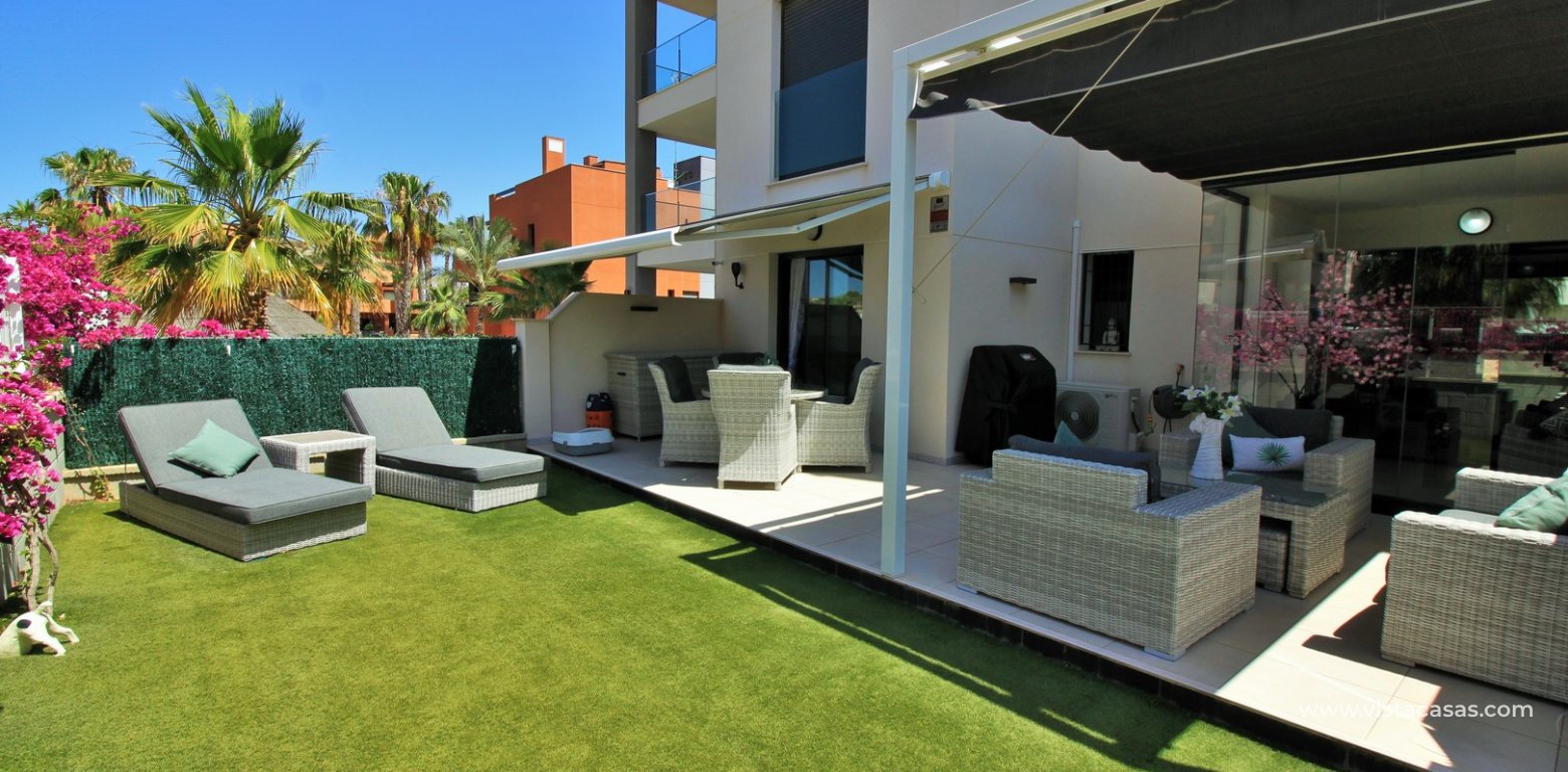 Ground floor apartment for sale Valentino Golf I Villamartin front garden 3