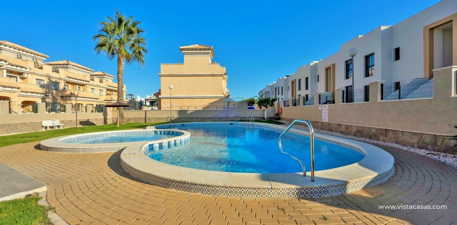 South facing 3 bedroom townhouse for sale Entregolf Villamartin pool