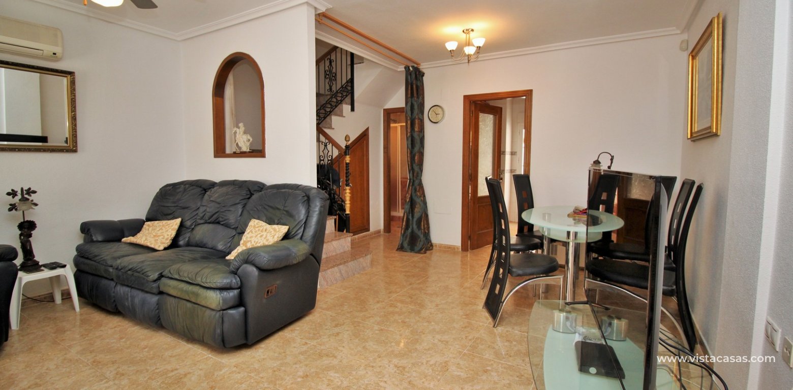 South facing 3 bedroom townhouse for sale Entregolf Villamartin lounge