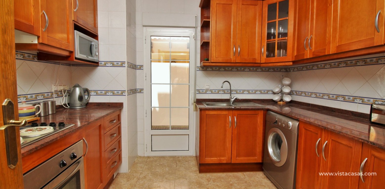 South facing 3 bedroom townhouse for sale Entregolf Villamartin kitchen