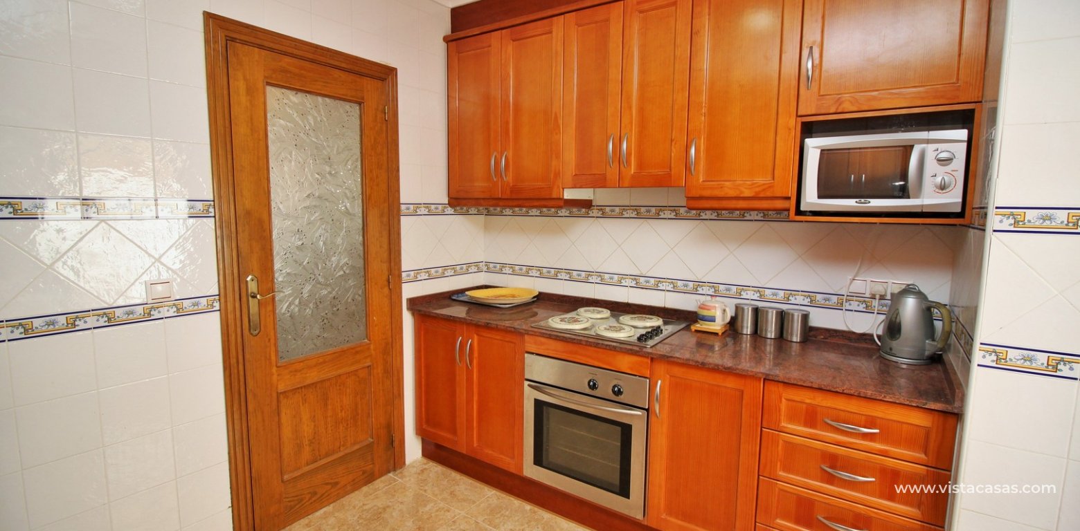 South facing 3 bedroom townhouse for sale Entregolf Villamartin kitchen 3