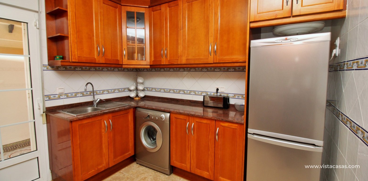 South facing 3 bedroom townhouse for sale Entregolf Villamartin kitchen 4