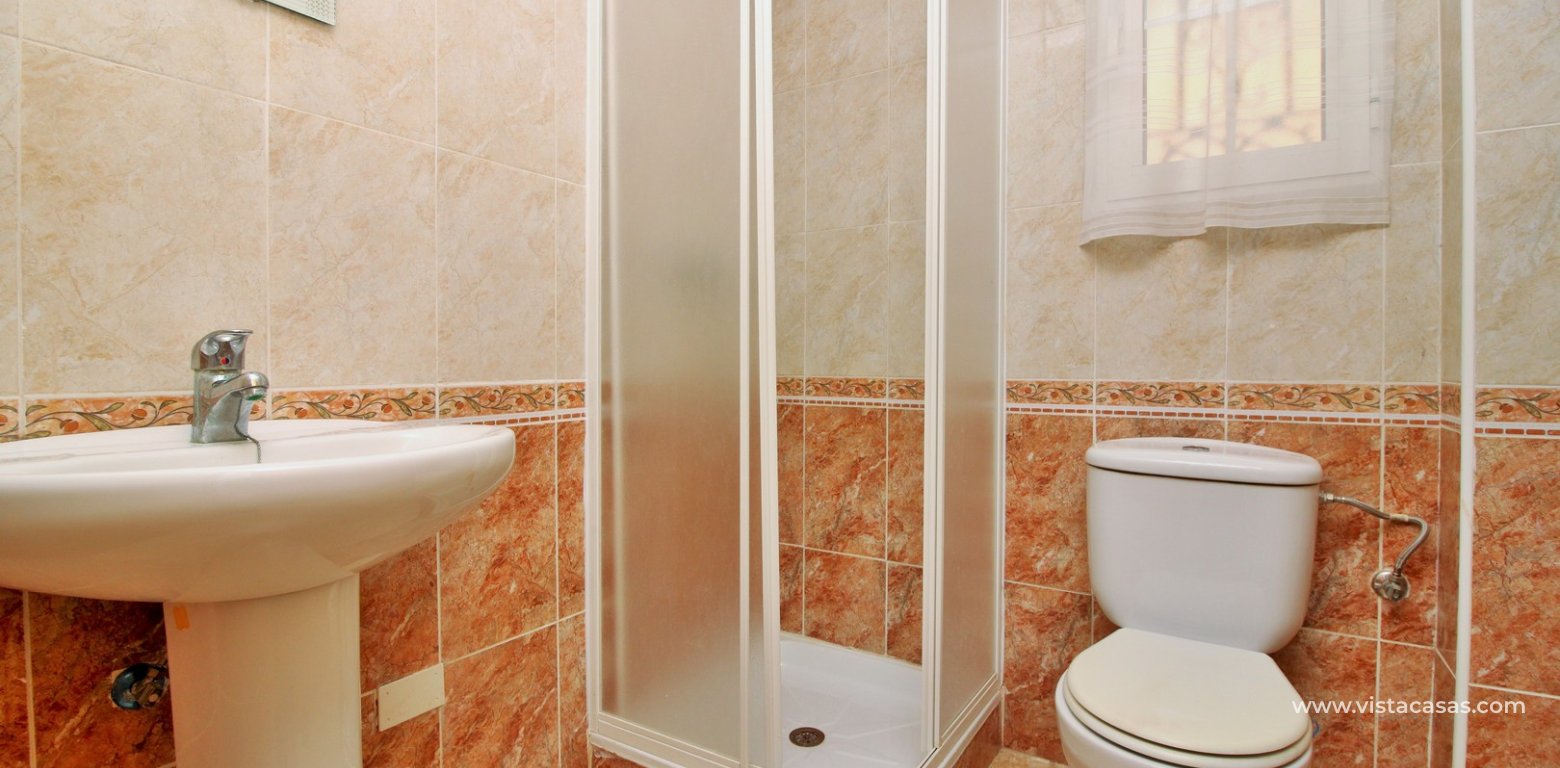 South facing 3 bedroom townhouse for sale Entregolf Villamartin downstairs bathroom