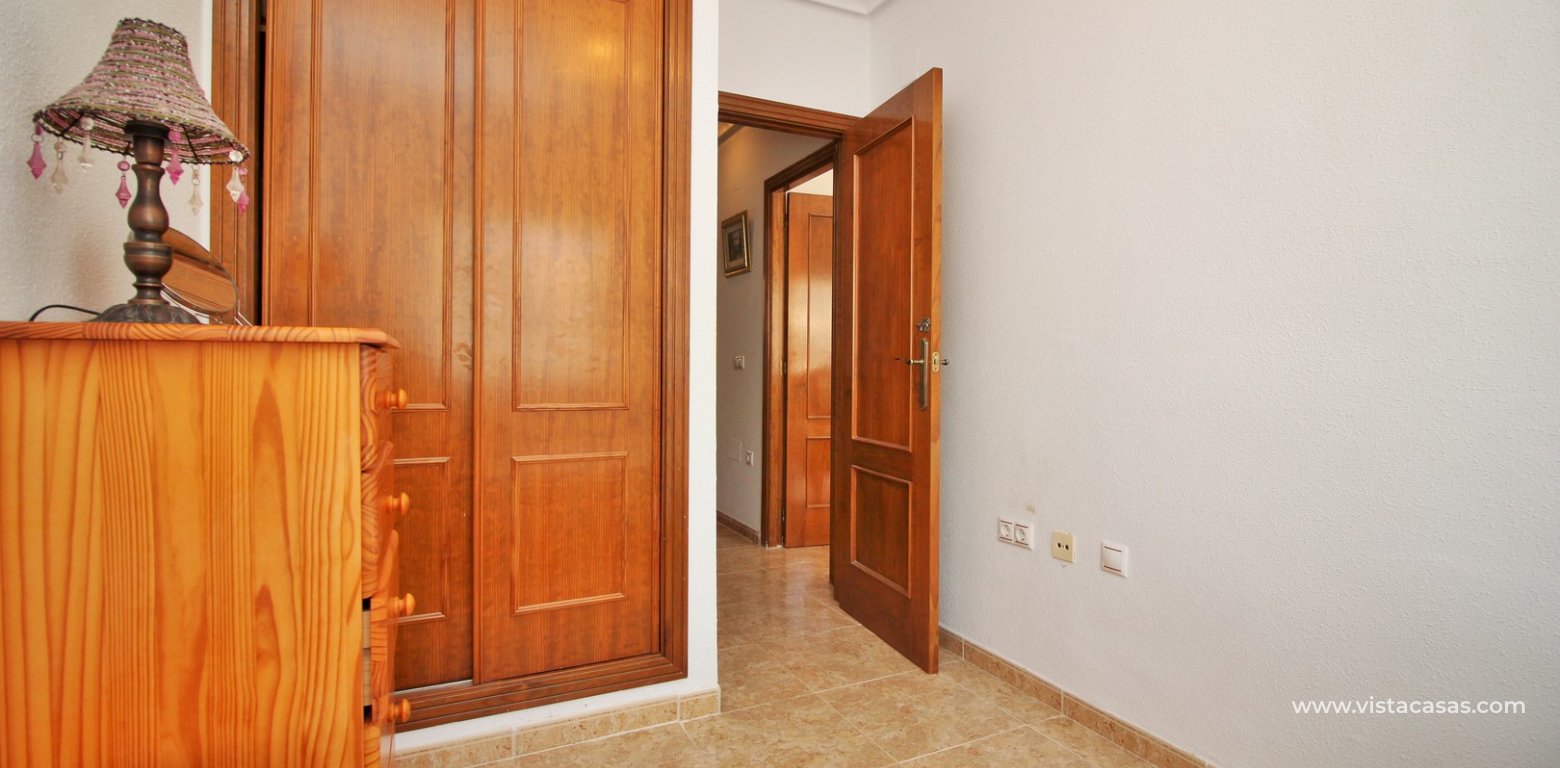 South facing 3 bedroom townhouse for sale Entregolf Villamartin twin bedroom fitted wardrobes