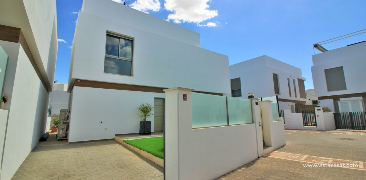 Detached villa with pool for sale Villamartin Paradise exterior driveway