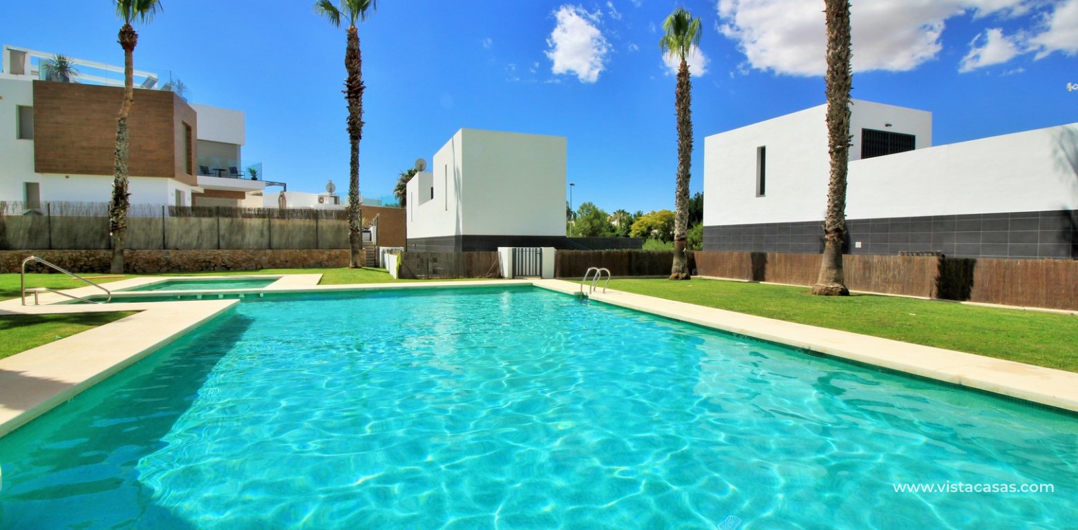 Detached villa with pool for sale Villamartin Paradise communal swimming pool