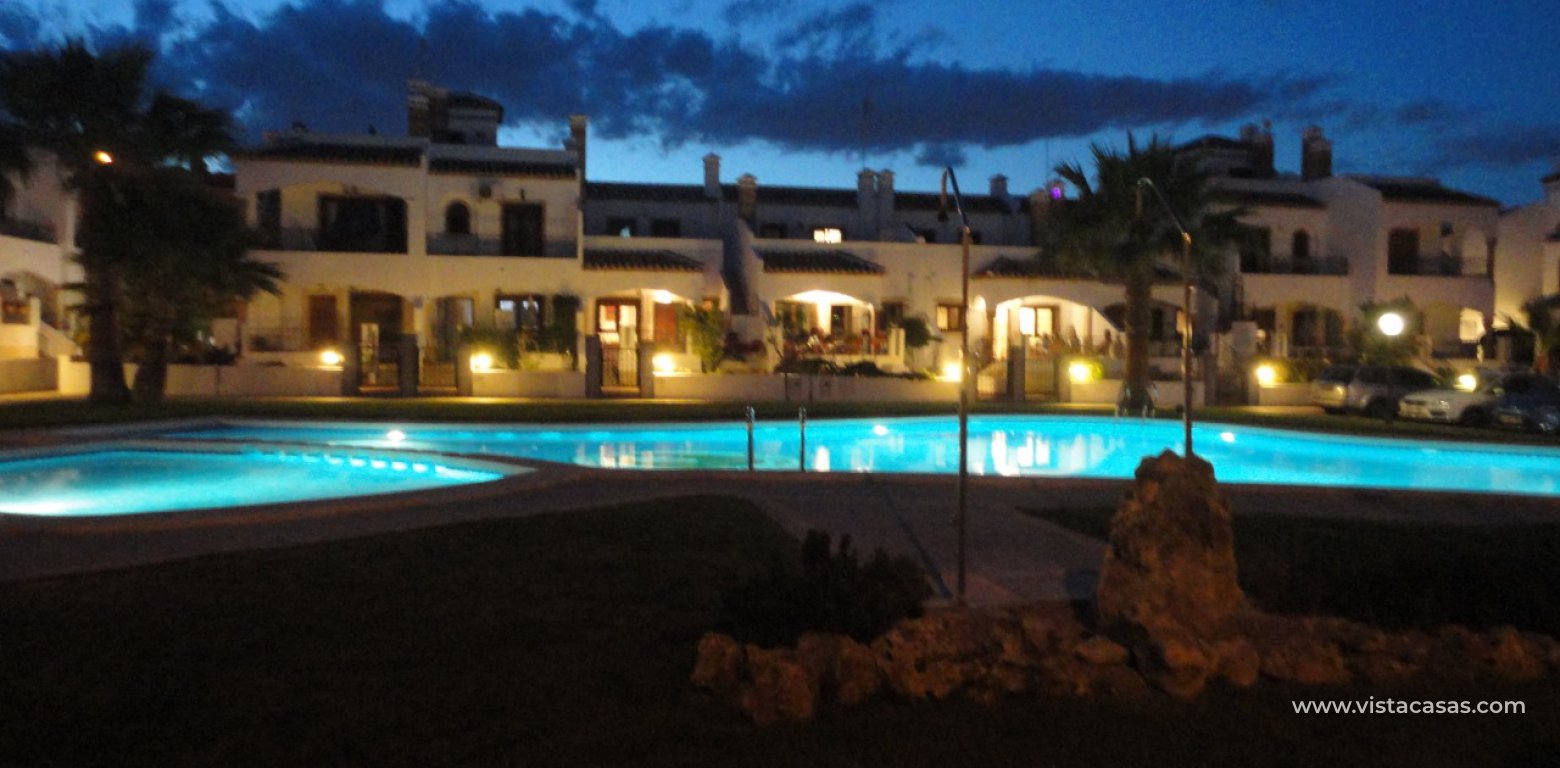 Townhouse for sale in Villamartin pool at night