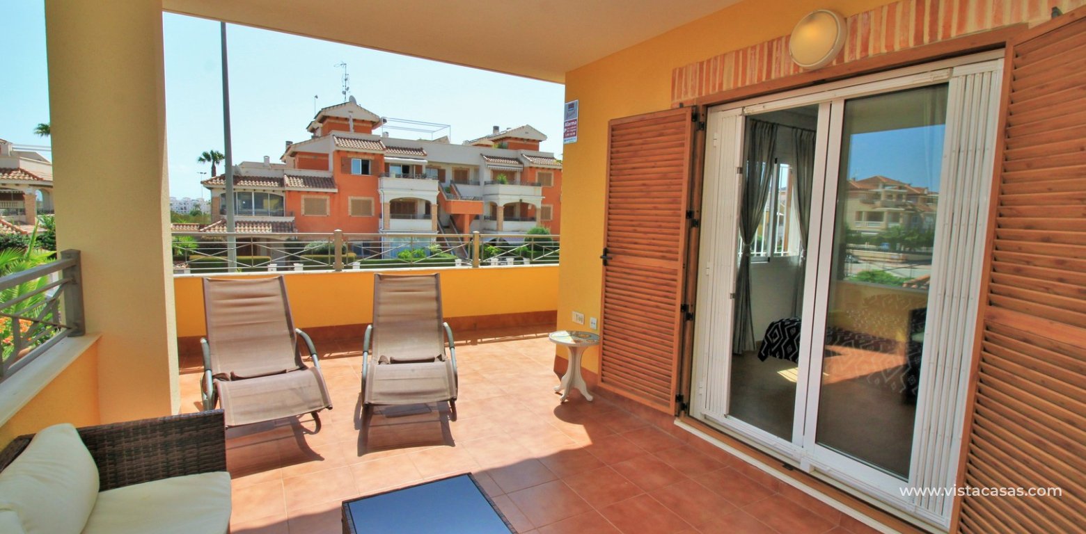 Townhouse with tourist licence for sale Zeniamar 9 Playa Flamenca covered balcony 2