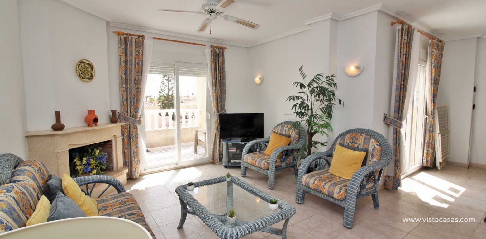 Penthouse apartment for sale Playa Flamenca lounge fireplace