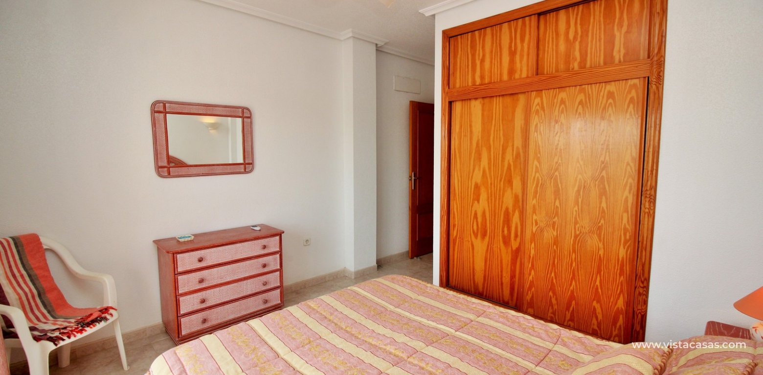 Penthouse apartment for sale Playa Flamenca master bedroom fitted wardrobes