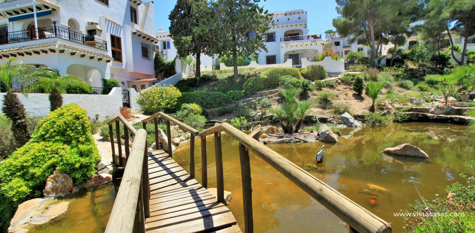 Property for sale in Villamartin communal gardens and water features