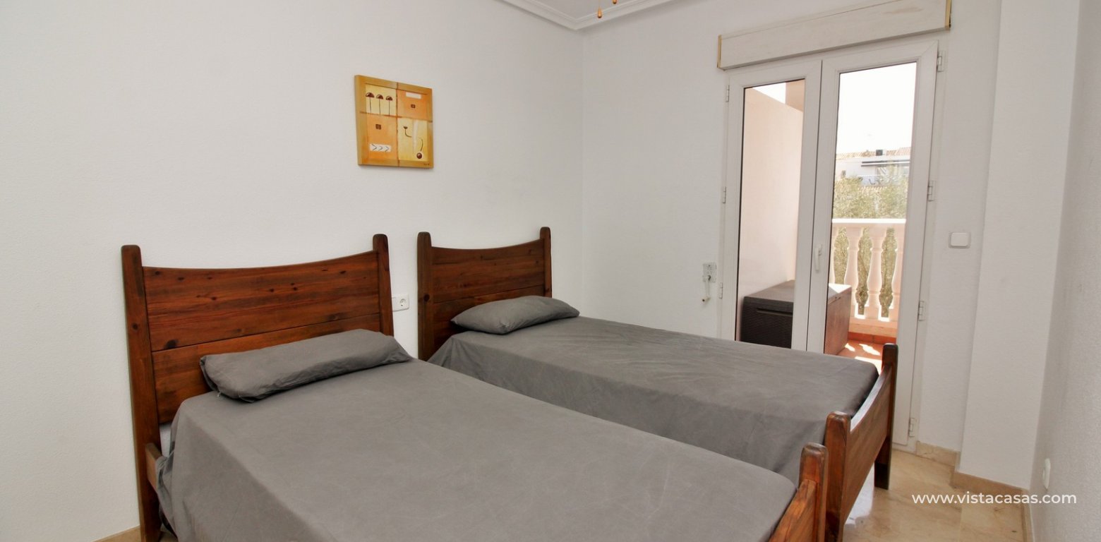 South facing apartment for sale Villamartin Plaza twin bedroom