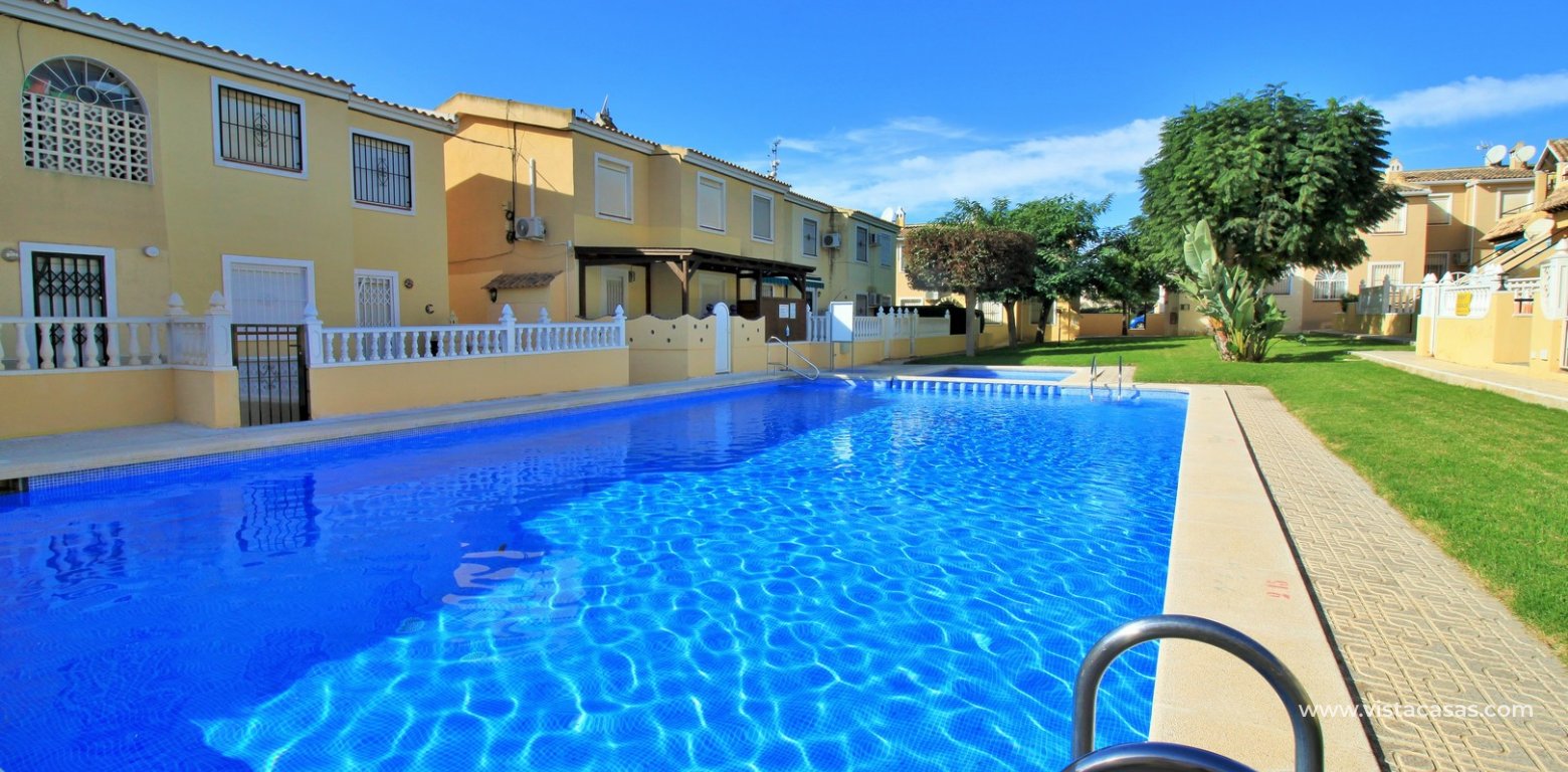 South facing townhouse for sale Villamartin Lomas del Golf communal pool