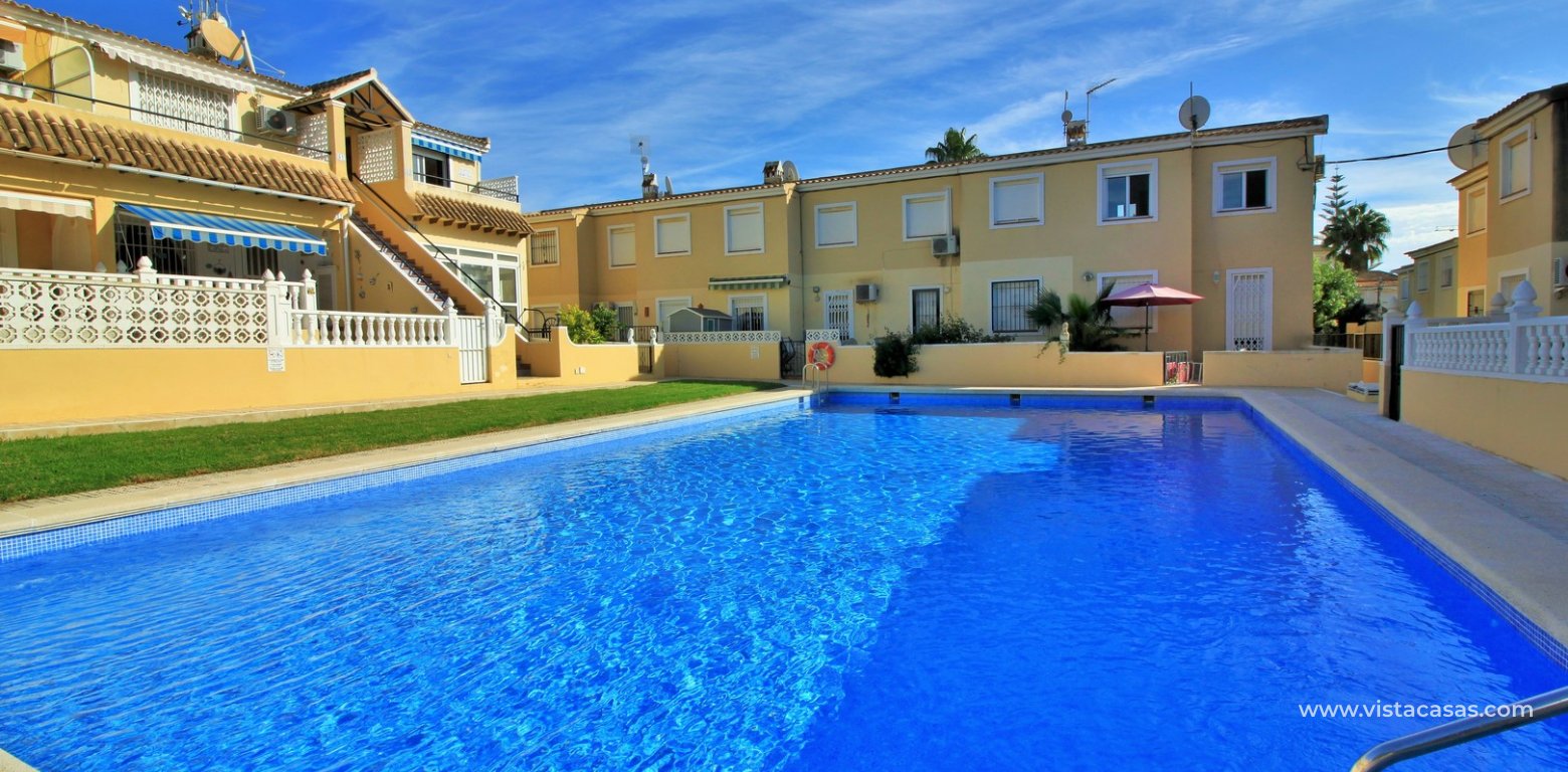 South facing townhouse for sale Villamartin Lomas del Golf swimming pool