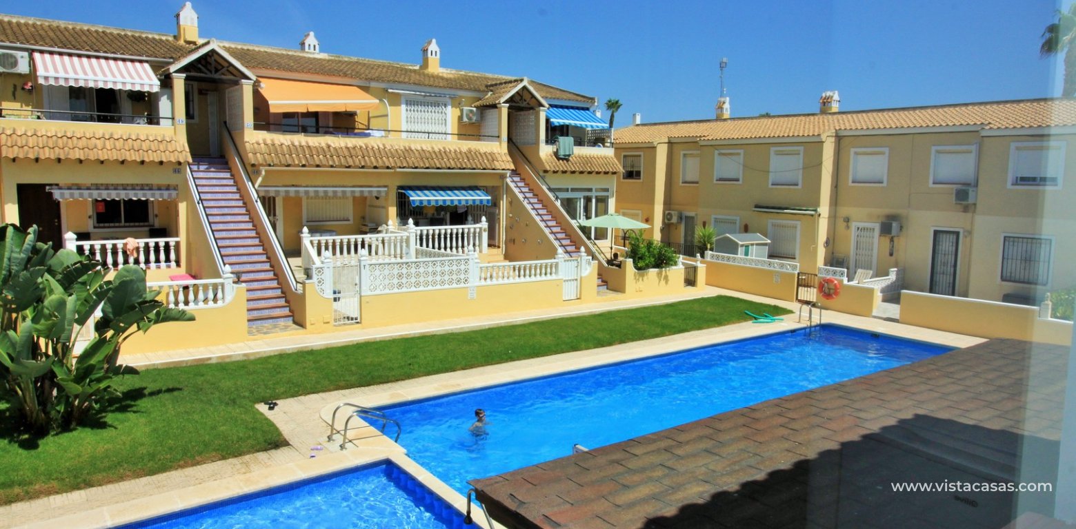 Top floor apartment for sale in Lomas del Golf Villamartin bedroom pool view