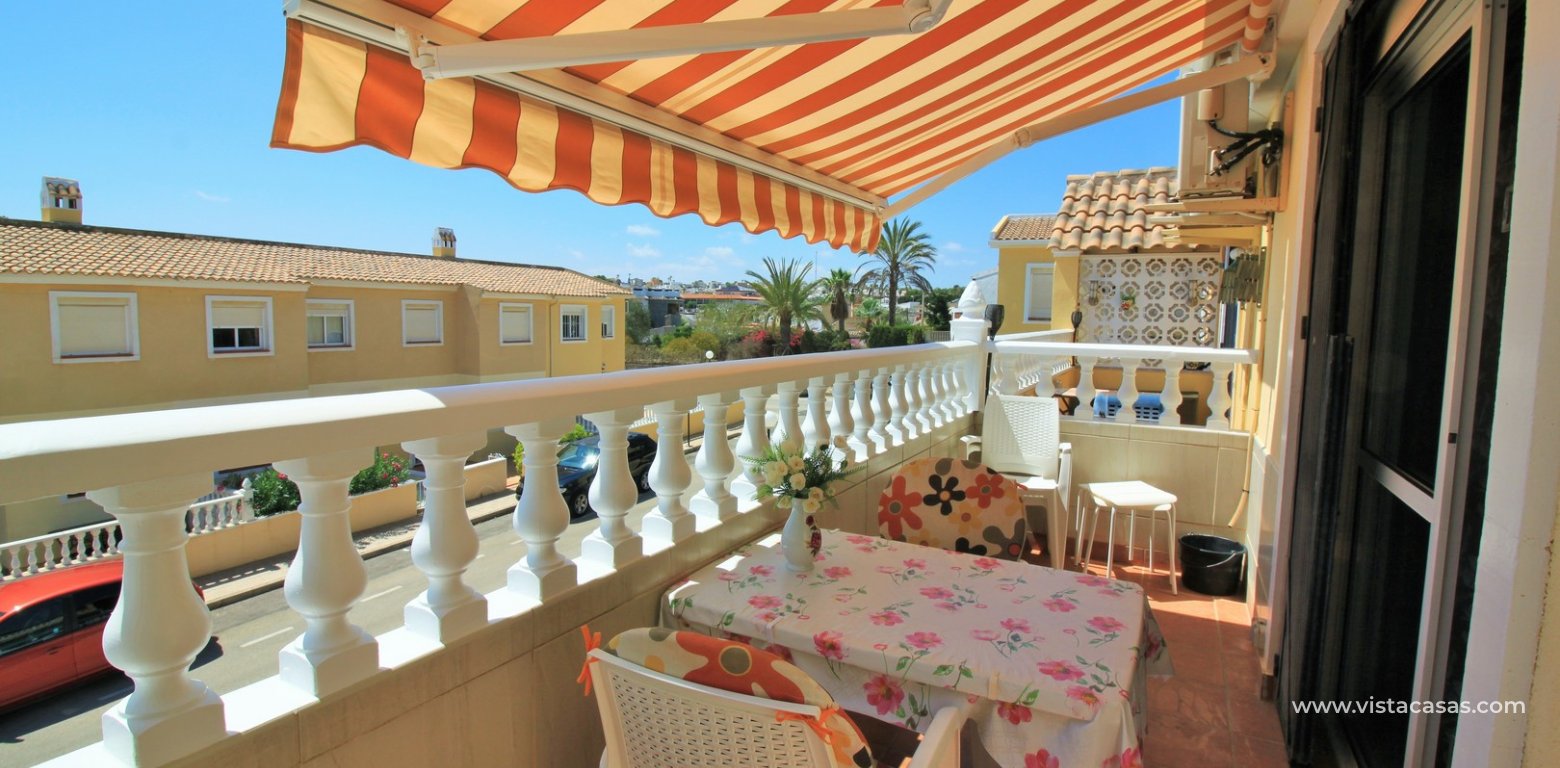 Top floor apartment for sale in Lomas del Golf Villamartin south facing balcony awning