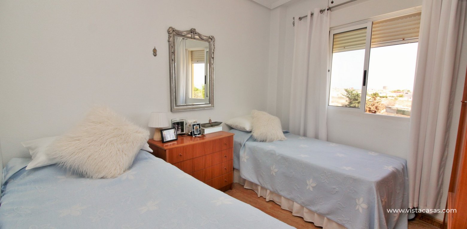 3 bedroom apartment for sale La Mirada Playa Flamenca twin bedroom