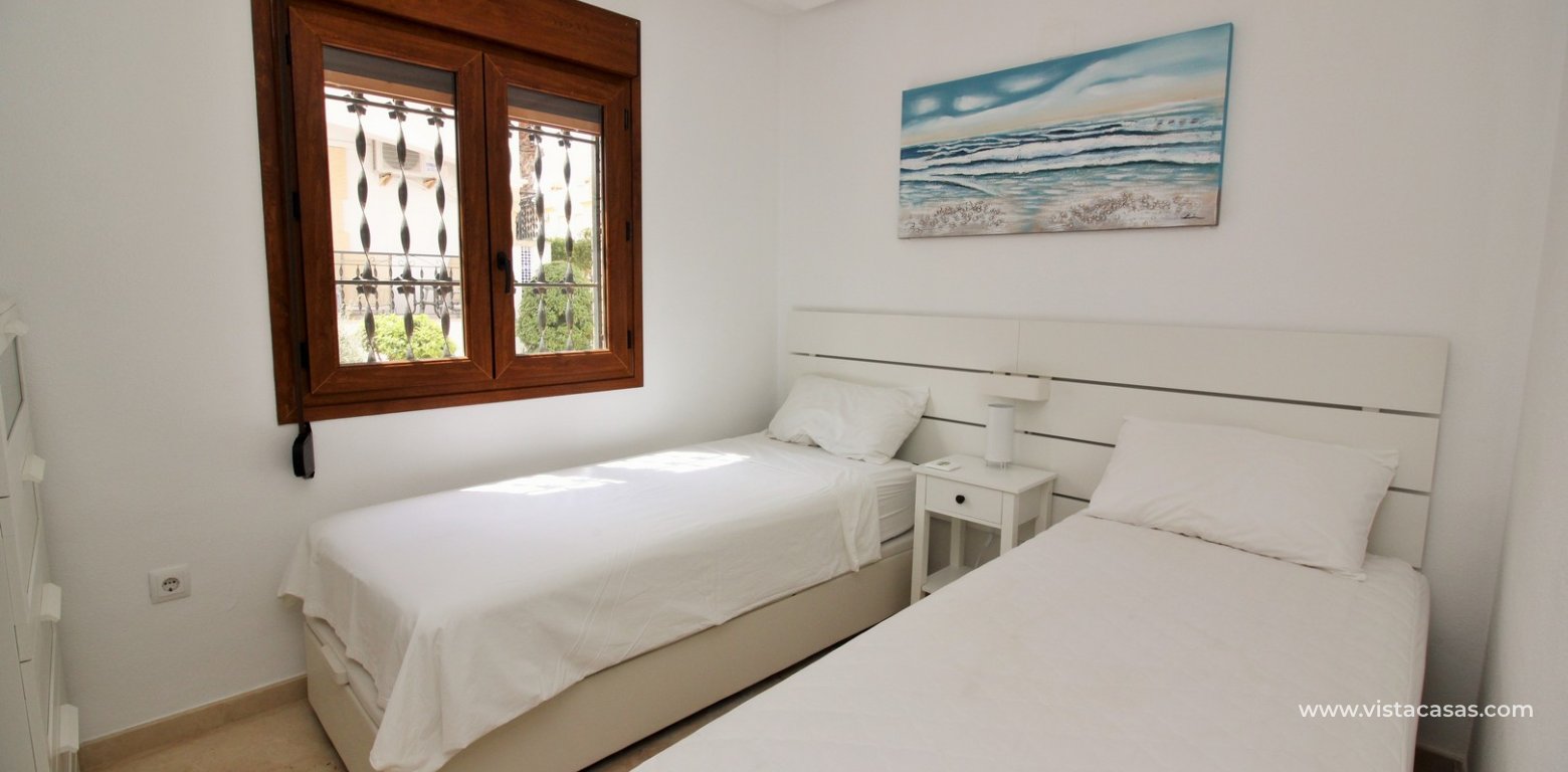 Ground floor apartment overlooking the pool for sale R9 Pau 8 Villamartin twin bedroom