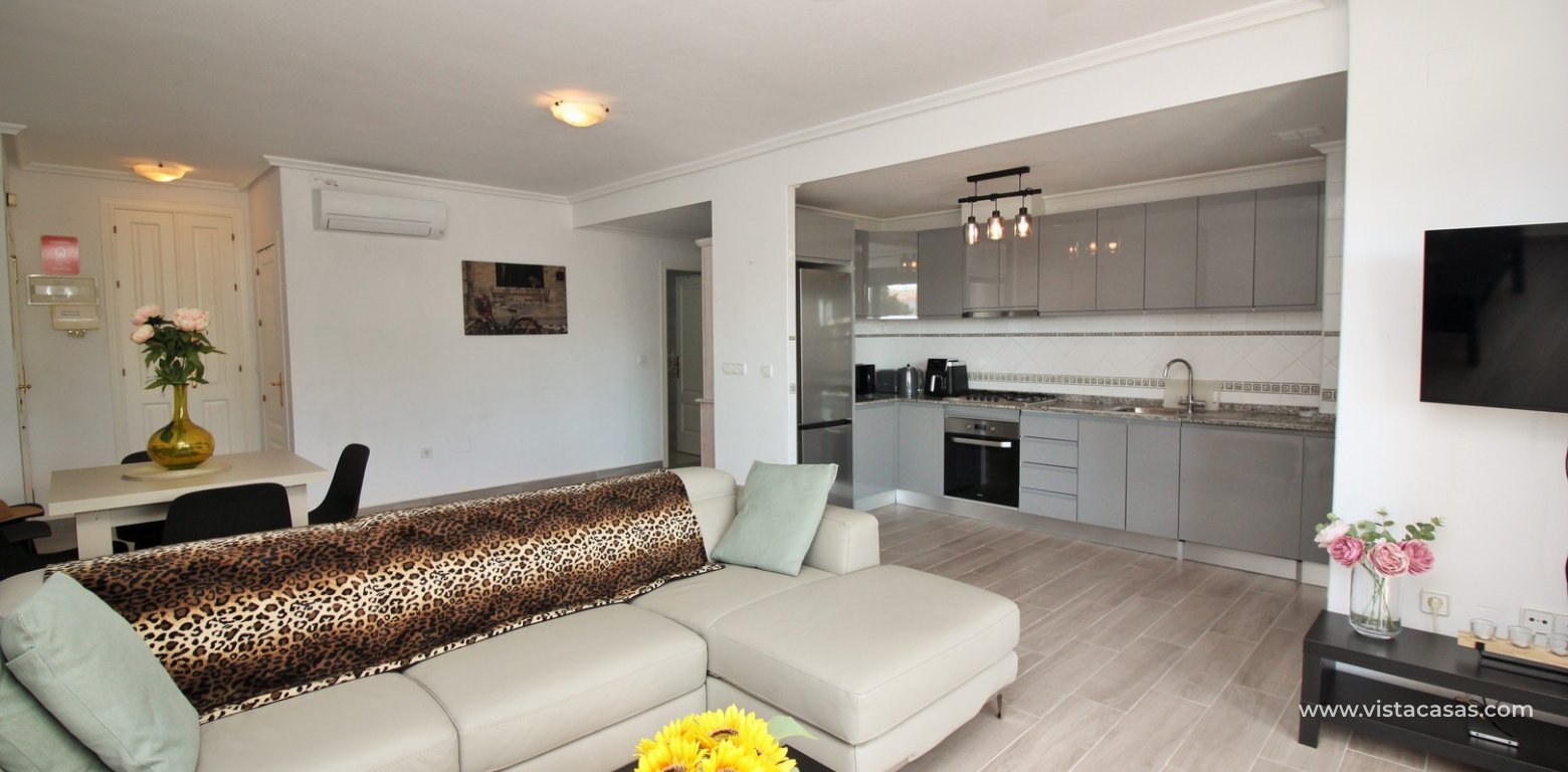 Renovated apartment for sale Campoamor Golf La Fuente lounge kitchen