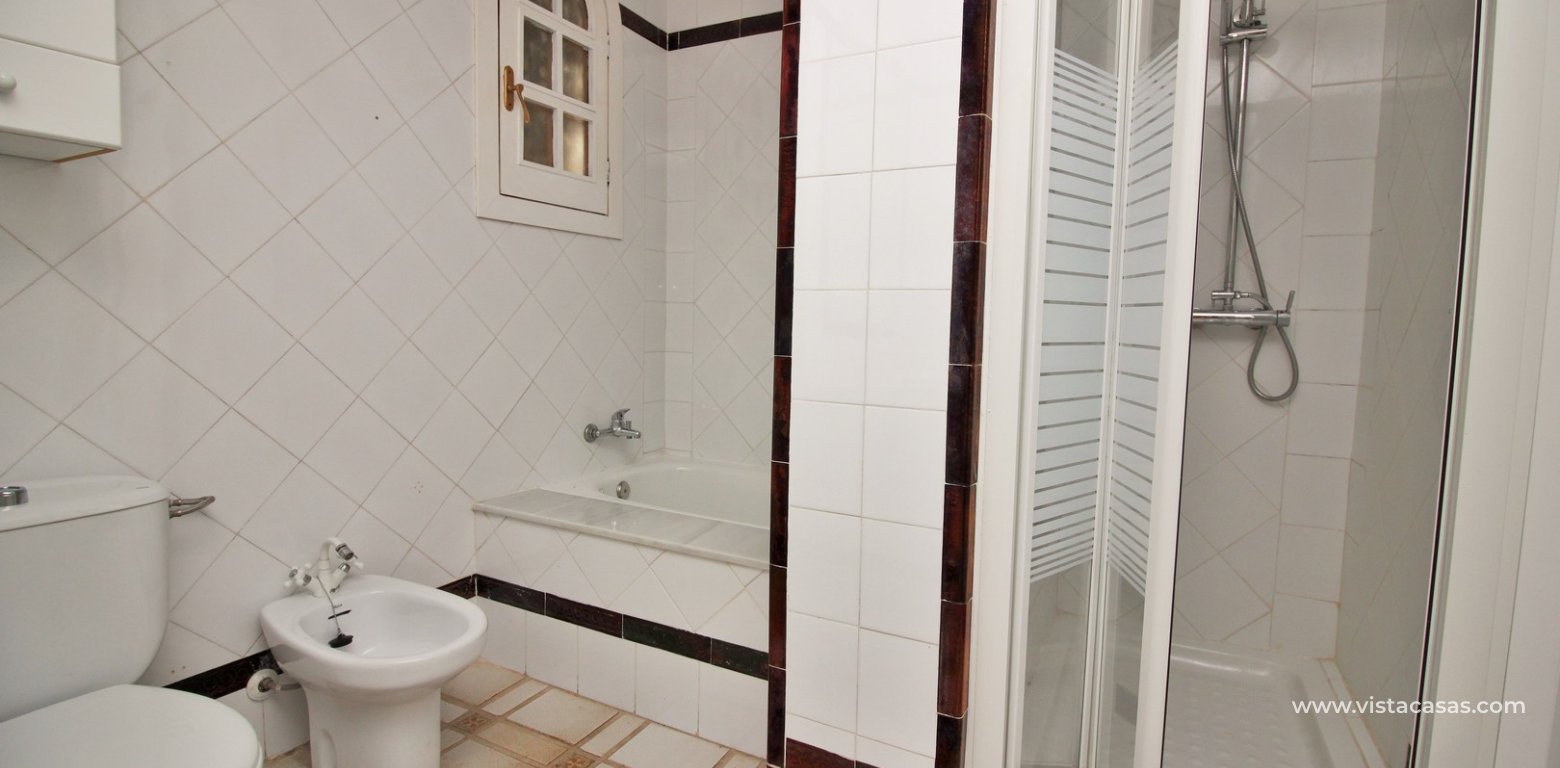 Apartment for sale with pool view in the Villamartin Plaza bathroom walk-in shower