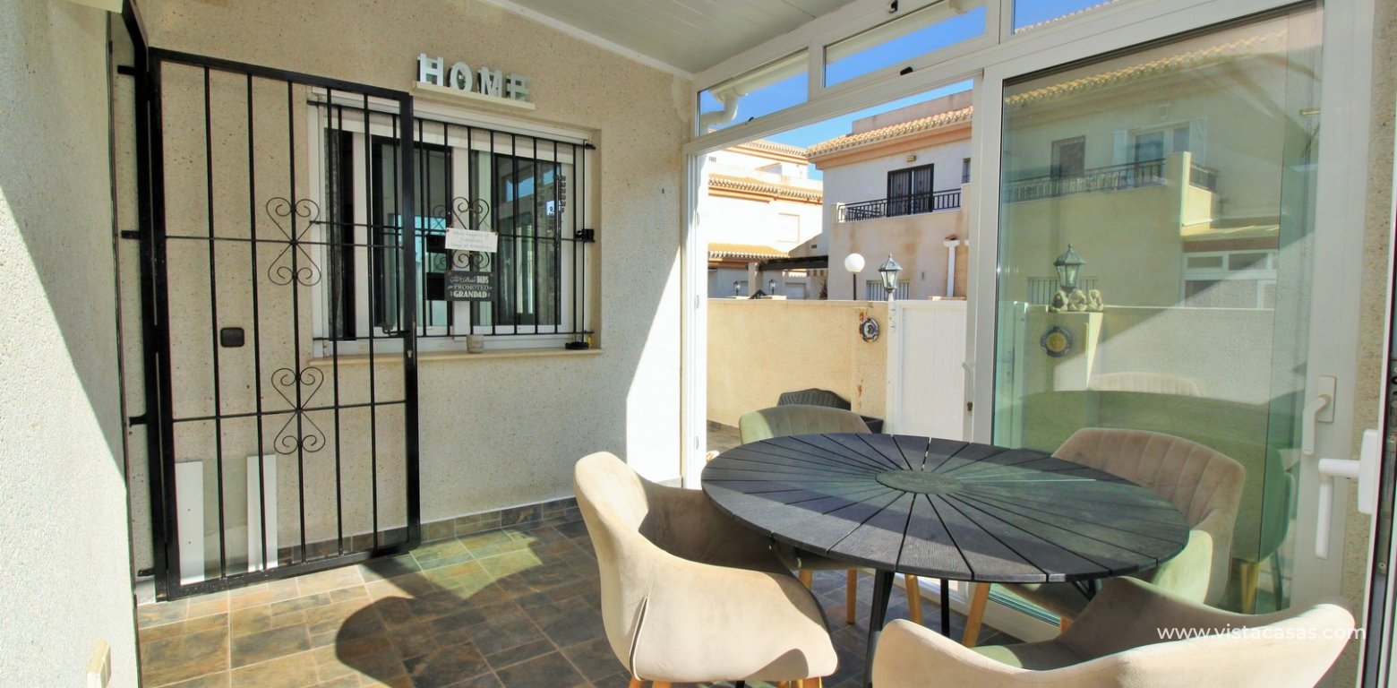 3 bedroom quad house for sale Vistaluz Playa Flamenca porch