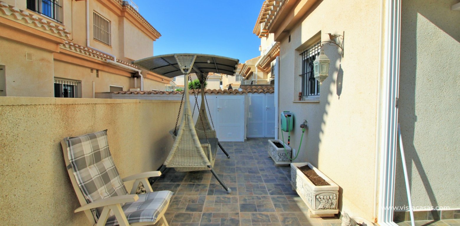 3 bedroom quad house for sale Vistaluz Playa Flamenca side terrace