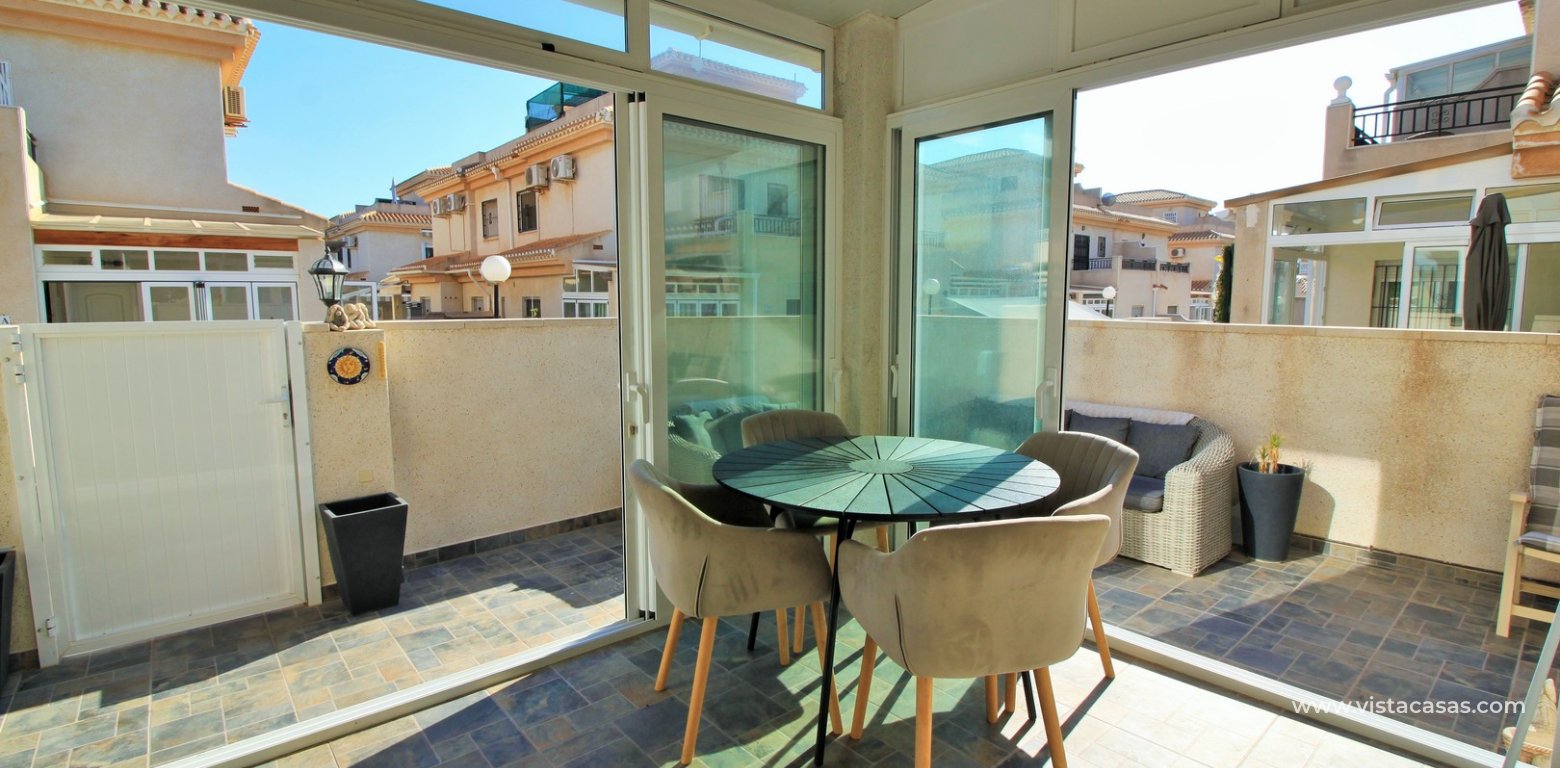 3 bedroom quad house for sale Vistaluz Playa Flamenca conservatory