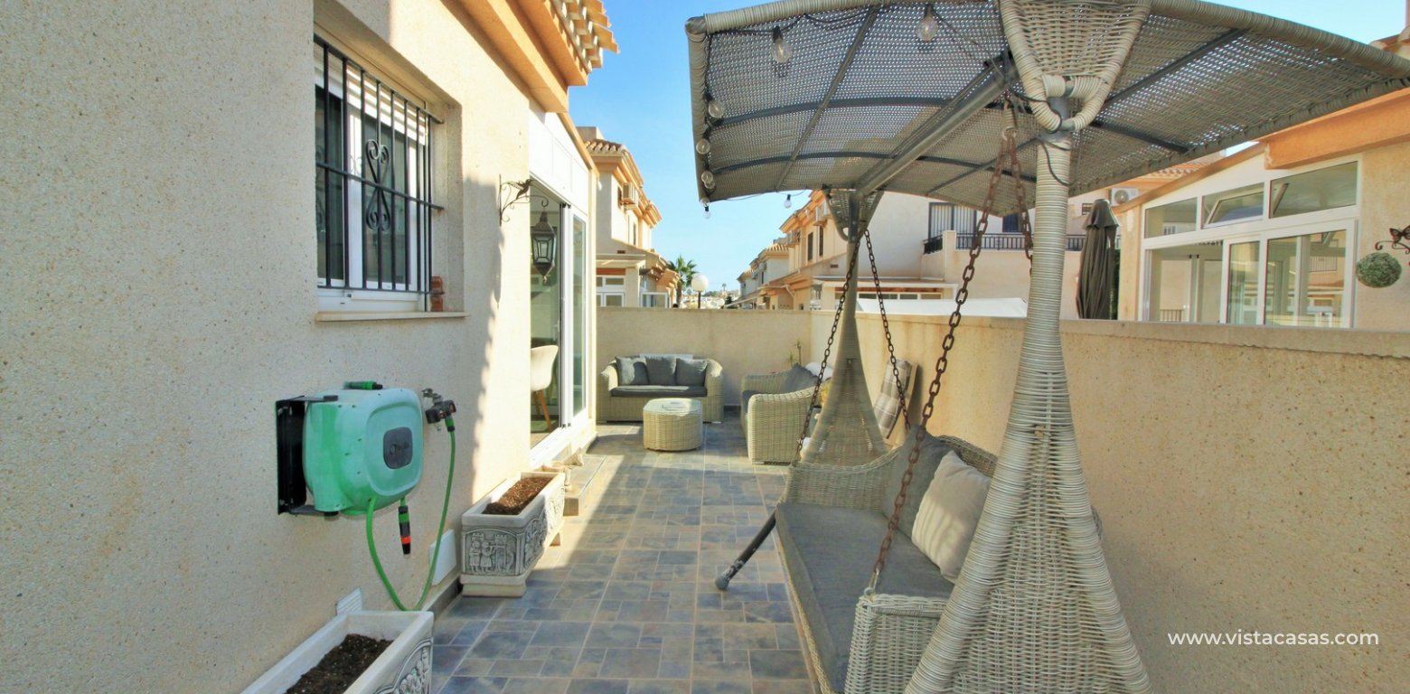 3 bedroom quad house for sale Vistaluz Playa Flamenca tiled garden 2