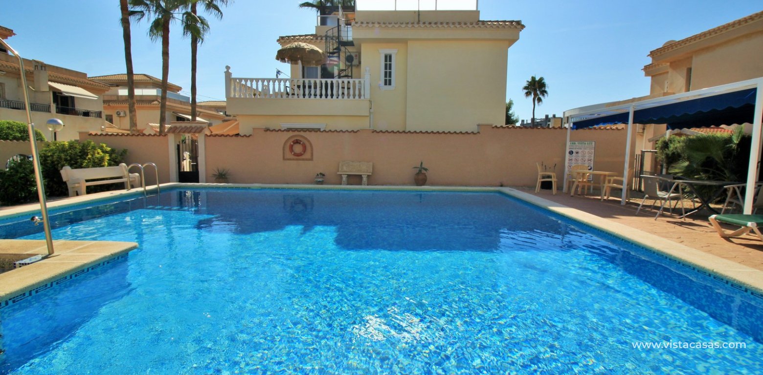 3 bedroom quad house for sale Vistaluz Playa Flamenca swimming pool