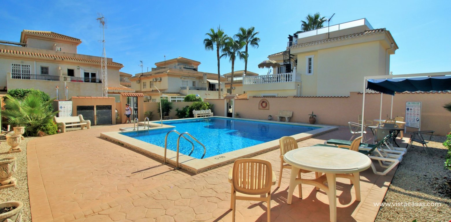 3 bedroom quad house for sale Vistaluz Playa Flamenca communal pool vista luz