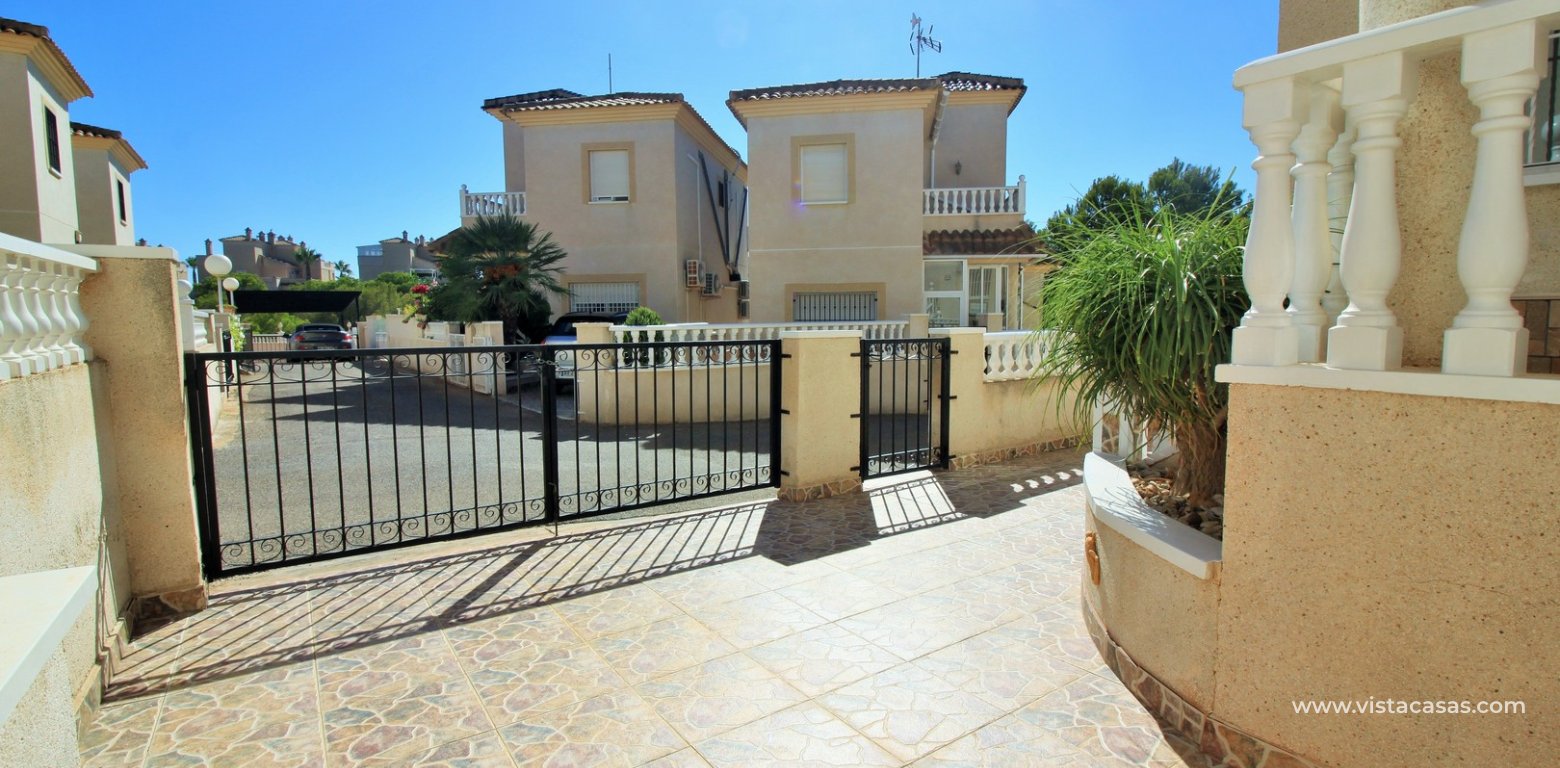 South facing detached villa for sale La Pinada Playa Flamenca gated driveway